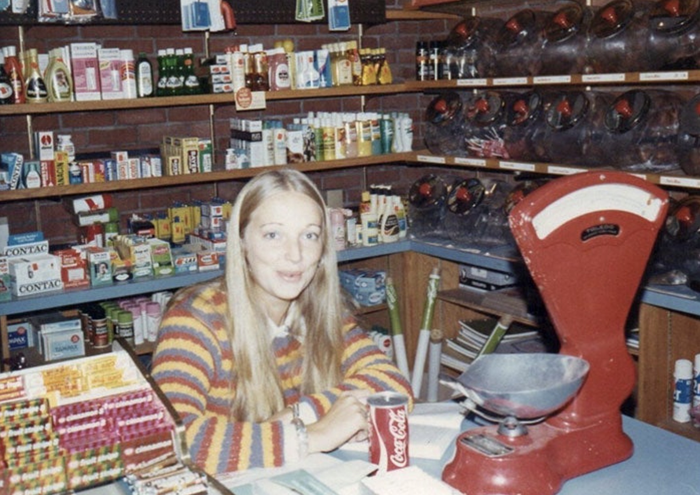 Teenager working at the local grocery store 1973. 